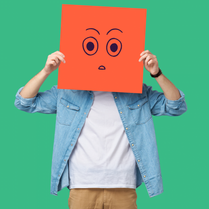 Business Simulation Games Delivery Partner Picture of a person holding an expressive face card to represent the delivery partner website for business simulations of GingrTech