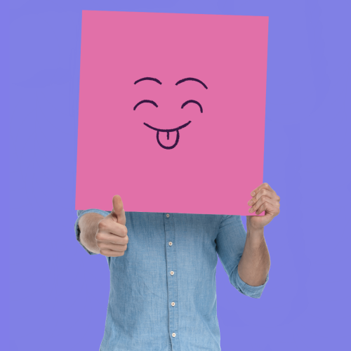 Learning Games Applications Picture of a person holding a happy face card with thumbs up to represent the applications of learning games.
